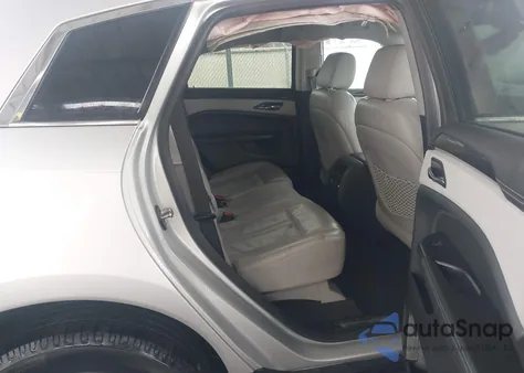 2014 Cadillac Srx Luxury Collection z USA, uszkodzony, nr VIN 3GYFNBE39ES686351